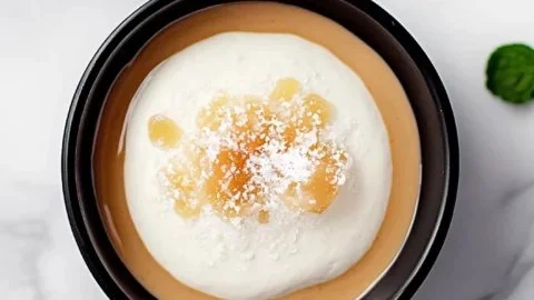 Delicious salted caramel mousse dessert served in a glass.