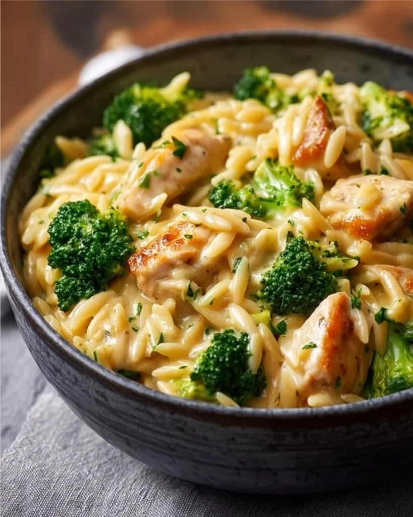 Delicious Cheesy Chicken Broccoli Orzo in a creamy sauce with fresh ingredients