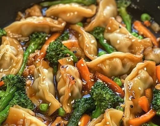 Delicious potsticker stir fry with colorful vegetables and savory sauce.